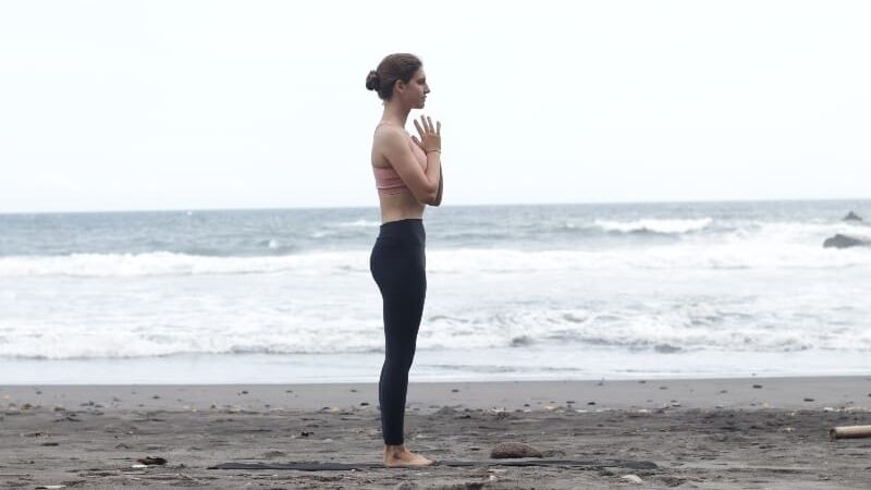 Beginner yoga class in Brixton learning Surya Namaskar with modifications